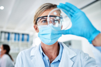 Scientist Analyzing Petri Dish GettyImages-1272736011