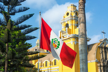 Church and Peruvian Flag-GettyImages-475480384
