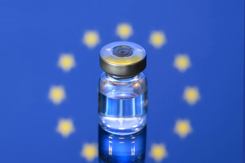 Vial ampoule vaccine, Corona Virus Covid-19 with European Union Flag-GettyImages-1296133347