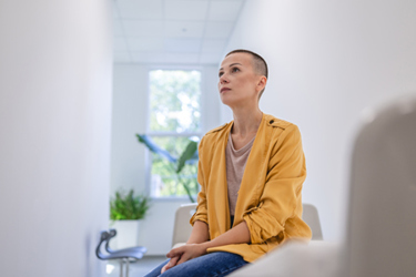 Woman waiting in oncology clinic 1 (high res)