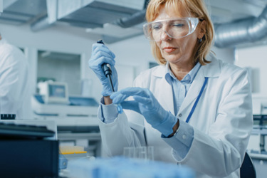 Scientist Using Pipette GettyImages-1140779660