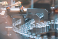The Most Difficult Outsourcing Tasks bottle filling machine-GettyImages-1268181219