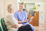 Study Participant Consenting — Can We Do A Better Job? Dental nurse-senior patient-GettyImages-1483191270