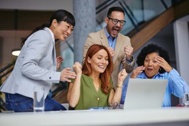 diverse team celebrating success, teamwork-GettyImages-2185791843
