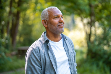 Elderly man in park in contemplative moment (high res) Elderly man in park in contemplative moment (high res)