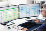 Accountant using online spreadsheet-GettyImages-1652010771