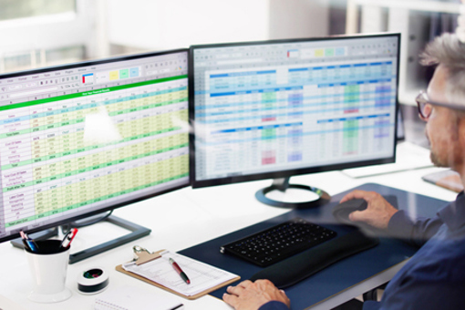 Accountant using online spreadsheet-GettyImages-1652010771