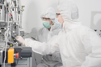 Clean room industrial laboratory manufacturing GettyImages-1344379591