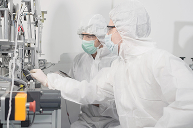 Clean room industrial laboratory manufacturing GettyImages-1344379591