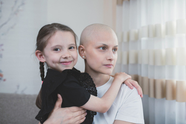 Child and mother-chemotherapy-GettyImages-1639457464