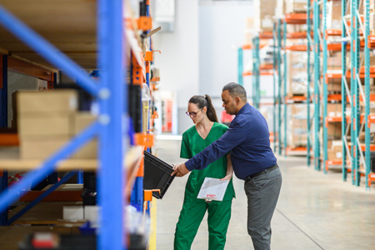Managers inspecting inventory in warehouse, medical supplies-GettyImages-2210267081 Managers inspecting inventory in warehouse, medical supplies-GettyImages-2210267081