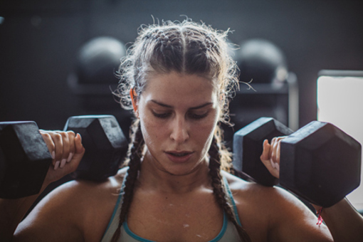 Woman weightlifting-GettyImages-700918900