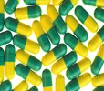 Encycle Therapeutics Advances Macrocycle Drug For IBD yellow-green pills_fotolia_DG_450x300
