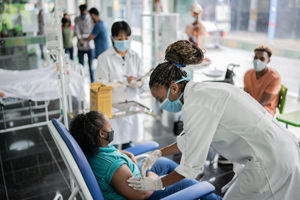 Early Phase Clinical Trials vaccination at medical clinic-GettyImages-1364924483