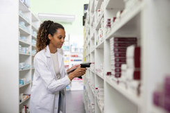 pharmacist taking inventory, healthcare, medicine-GettyImages-2208575496