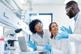 scientist in lab discussing research-GettyImages-2194013442