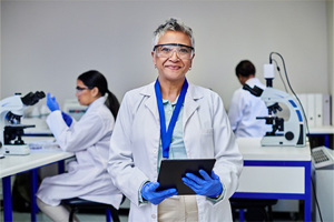 GettyImages-2205869783-scientist-tablet-lab-data-digital