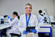 GettyImages-2205869783-scientist-tablet-lab-data-digital