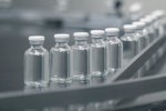 GettyImages-2173467618-vials-conveyor-belt