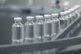 GettyImages-2173467618-vials-conveyor-belt