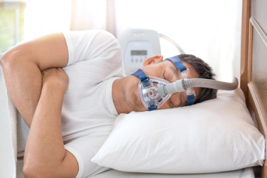 Man sleeping CPAP-GettyImages-629586444