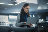 The Future Of Clinical Research Enrollment GettyImages-1489414892 Technological Software Engineering Department Manager Using A Laptop