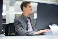 2024 Safety And Regulatory Compliance Trends And Predictions GettyImages-1455543808 IT worker at computer