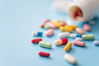 Multicolored pills-GettyImages-1370358685
