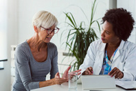 patient and doctor iStock-1211396399