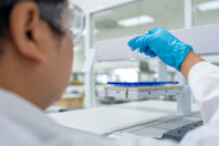 Accelerating IND-Enabling Studies With Automated Bioanalysis Workflows GettyImages-2158124620-scientist-laboratory-containers-testing-analysis