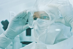 GettyImages-2275234118-cleanroom-lab-scientist-PPE