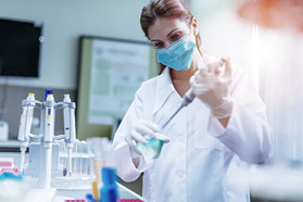 Process Development Scientists laboratory pipette GettyImages-621351044
