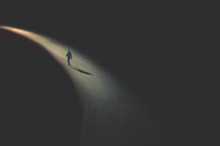 Man Walking IN Shadow