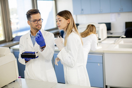 Young Researchers in Laboratory-GettyImages-1278777784