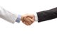 Doctor and businessman shaking hands-GettyImages-2152692597