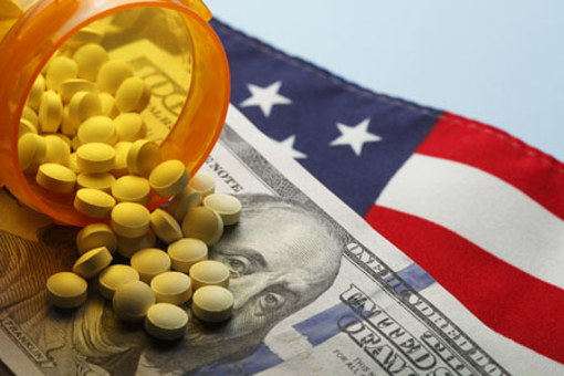 pills spill on 100 dollar bill-GettyImages-826130422