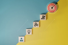 10 Steps To Designing An Industrial Data Architecture For Scale GettyImages-1589361544-steps-achieve-target-arrow-gears