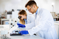 GettyImages-1293879301-scientists-inspecting-analyzing-lab